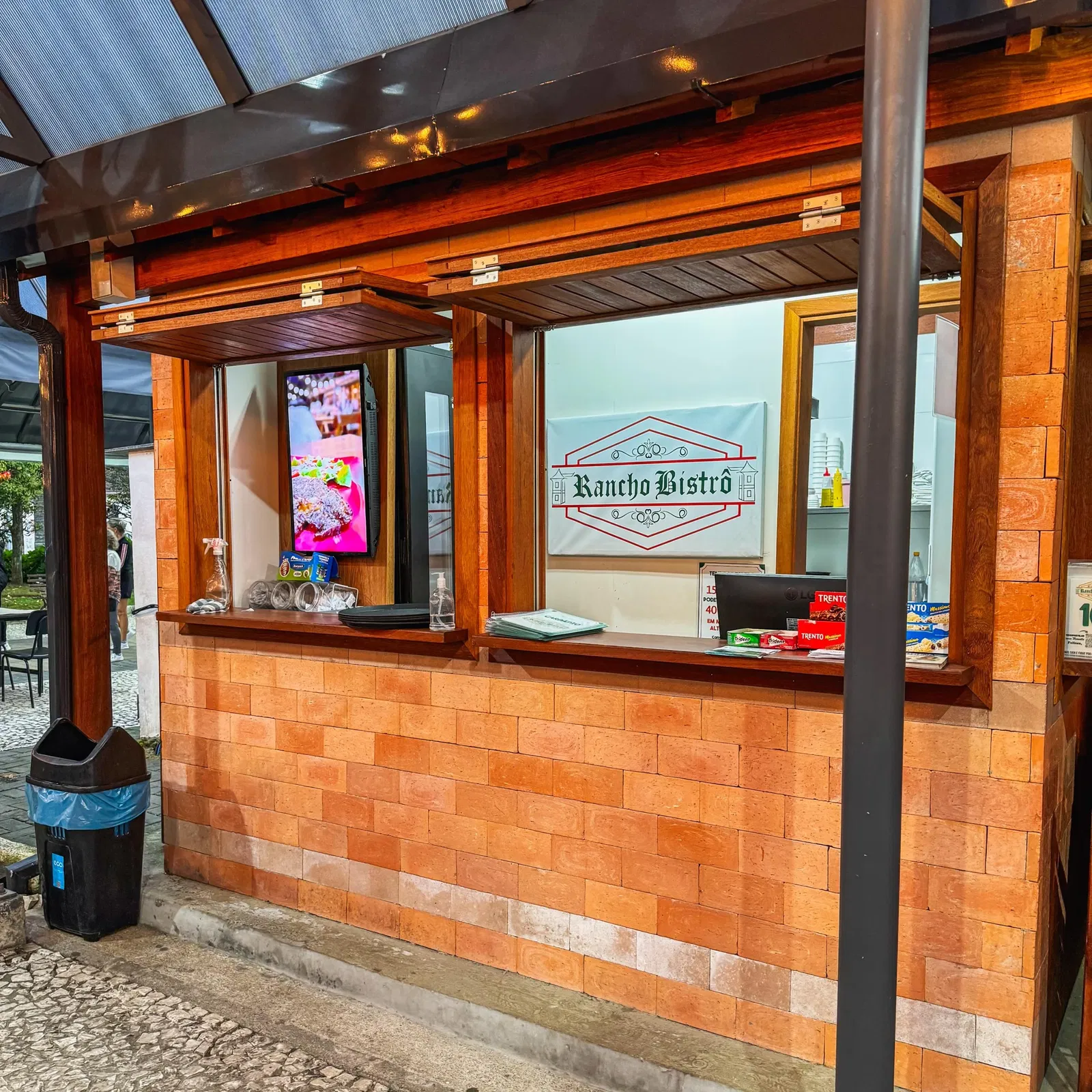 elegant bistro restaurant interior, mountain lodge style, fine dining setup, warm lighting