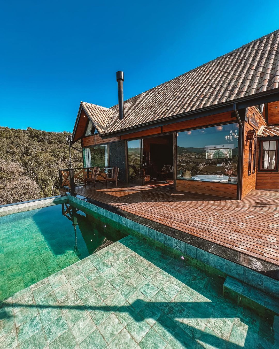 romantic couples retreat with heated pool and jacuzzi, panoramic mountain views vale de taquaras, luxury chalet